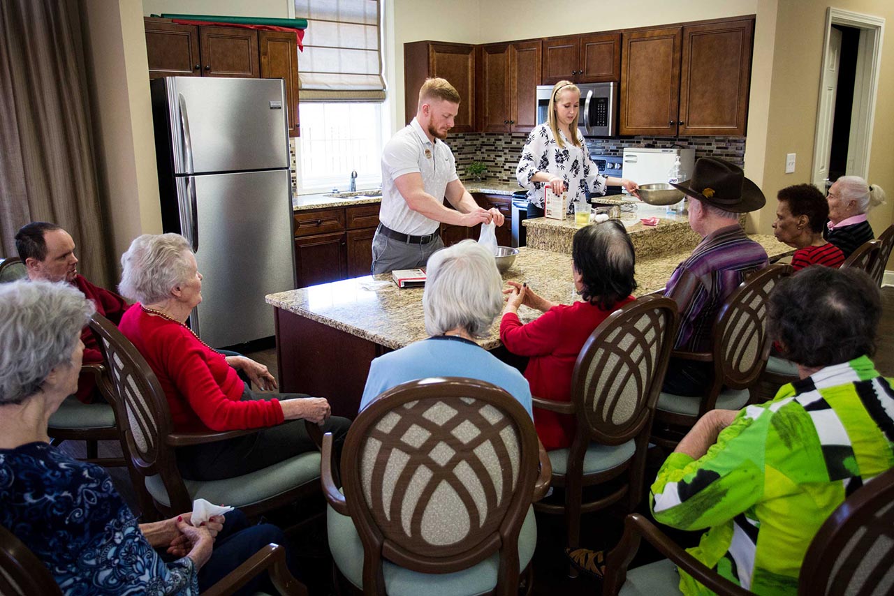 residents watching a chef presentation